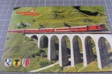 Sedrun Bugnei Viadukt mit Zug 